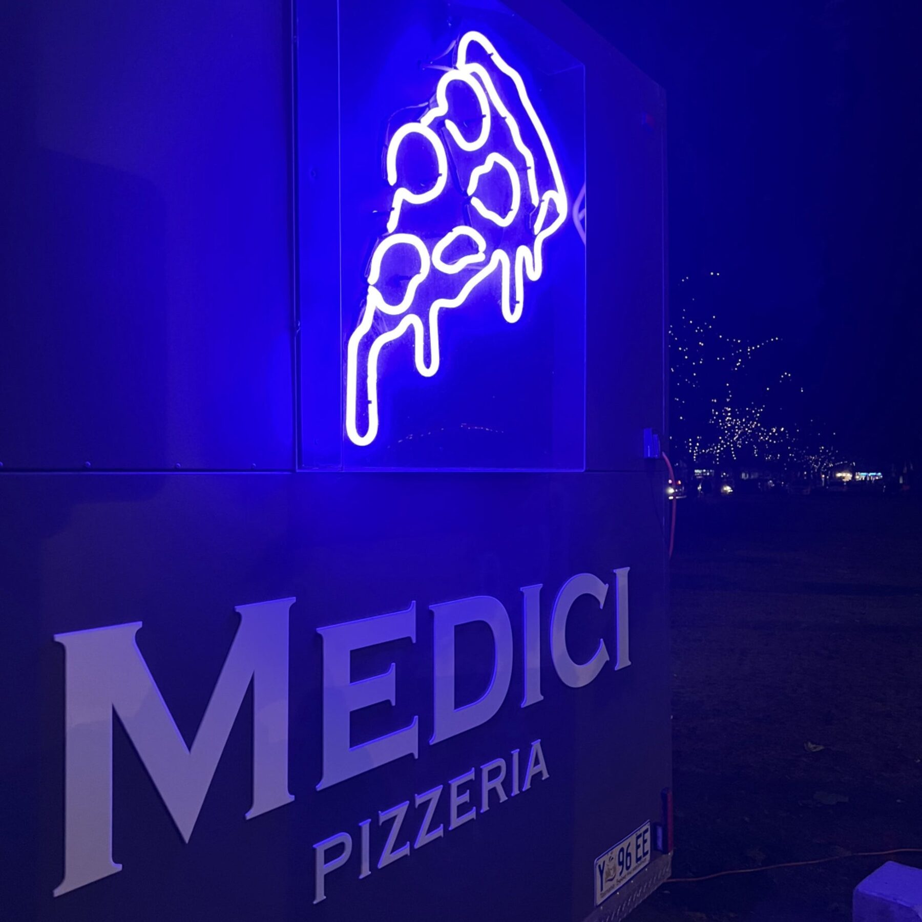 Medici pizza truck neon sign